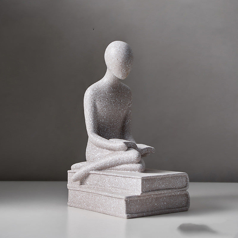 Figurine humaine abstraite grise — décoration minimaliste salon