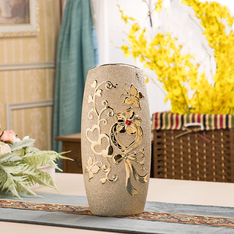 Vase céramique électroplaqué doré — motifs floraux délicats