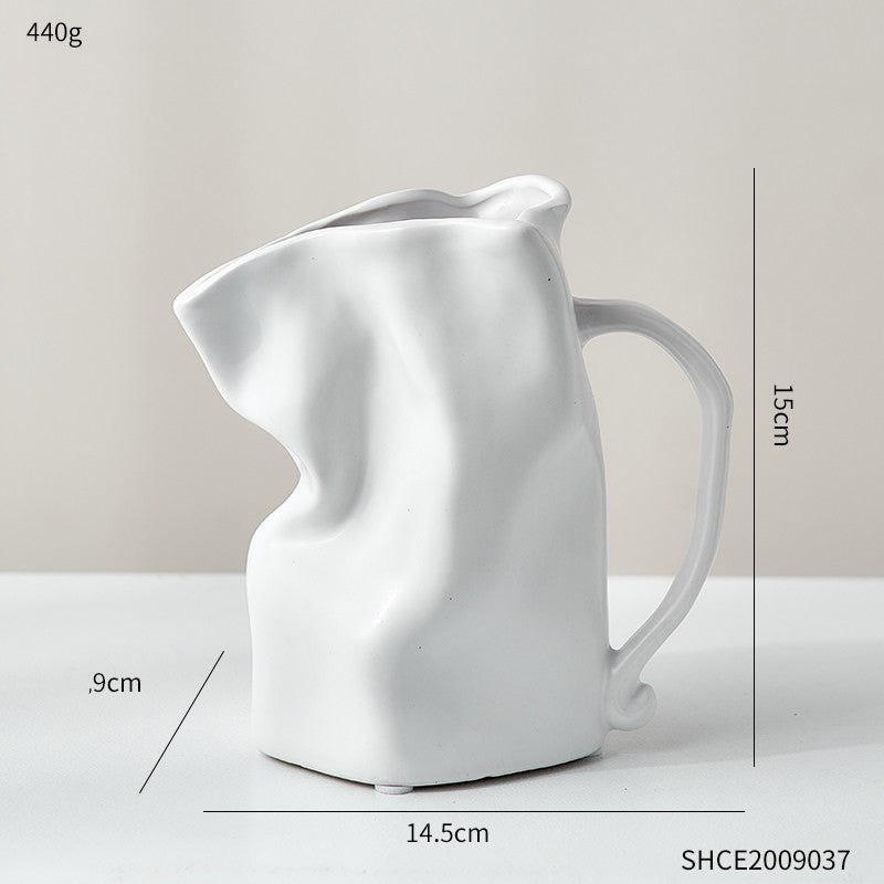 Vase céramique sculpté noir — décoration moderne salon